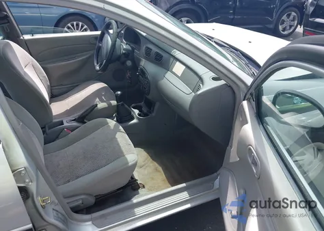 1999 Ford Escort Lx z USA, uszkodzony, nr VIN 1FAFP10P6XW164410